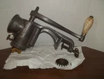 Lot 676 - Vintage Meat Grinder Universal 1572 Metal With Wooden Handle. Fixed Price $20.00.