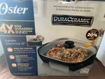 Oster Titanium Infused Duraceramic 12 Electric Skillet. Fixed Price $49.99.