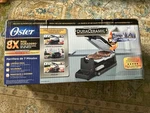 New Oster 7 Minute Vertical Flip Duraceramic Indoor Grill - Black Open Box. Fixed Price $20.00.