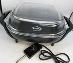 Rival Black 12" Pebbled Glass Dome Lidded Electric Skillet.. Fixed Price $62.99.