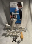 Universal Star -gourmet Meat Chopper Grinder With Multiple Attachments Model 323. Fixed Price $24.99.