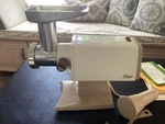 Oster Food Grinder Model 480 E, With Attachments, And Original Paperwork. Fixed Price $62.99.