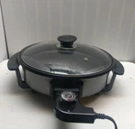Electric Non-stick Pizza Cooker Oven Totilla Roti Chapati Warmer Skillet 1500W. Fixed Price $79.99.