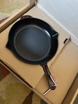 Staub Cast Iron 10-INCH Fry Pan Grenadine 2.1 Quart. Fixed Price $185.00.