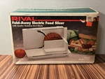 Vintage Rival Fold-away Electric Food Slicer Model 1044 New Open Box Works. Fixed Price $49.99.