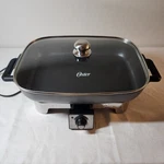 Oster Designed For Life Removable 16" X 12" Electric Skillet Model CKSTSKRM16DFL. Fixed Price $49.99.