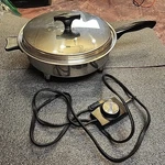 Webalco Stainless Steel Liquid Core Electric Skillet Long Handle Straight Legs. Fixed Price $50.00.