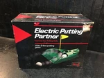 The Original Oscar Electric Putting Partner Model JR-103 New Box. Fixed Price $20.40.