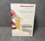 Kitchen Aid 3-PIECE Pasta Roller & Cutter Set, Style: Ksmpra, New In Box. Fixed Price $104.85.