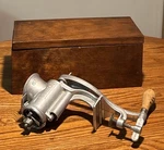 Vintage Universal 1572 Aluminum Meat Grinder W/ Original Wooden Box Plates. Fixed Price $89.99.