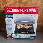 George Foreman 4 Serving Grill & Panini Press Removable Plates Silver Nib. Fixed Price $24.00.