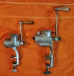 Two Vintage Meat Grinders - Universal #72 Cast Iron & Aluma #2. Fixed Price $29.00.