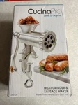 Cucinapro Cast Iron Meat Grinder Tabletop Clamp W/ 2 Cutting Disks. Fixed Price $34.99.