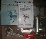 Weston Meat Grinder & Sausage Stuffer, Never Used, Box W/ Attachments. Fixed Price $17.99.