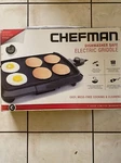 Chefman Dishwasher Safe Electric 160SQ.IN Surface Griddle (model RJ23-SM). Fixed Price $34.99.