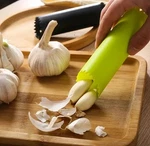 1PC Silicone Garlic Peeler Tube With Cleaning Brush Easy Stripper - New. Fixed Price $9.65.