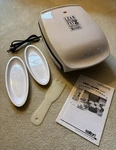 George Foreman GR-20 Lean Mean Grilling Machine! Drip Trays Manual Spatula. Fixed Price $34.99.