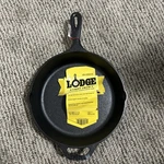 Lodge 10.25 Inch Seasoned Cast Iron Skillet L8SK3. Fixed Price $20.00.