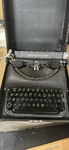 Remington Rand Manual Portable Vintage Steel Typewriter With Case. Fixed Price $300.00.