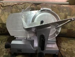 Backyard Pro SL112E Butcher Series 12" Manual Gravity Feed Meat Slicer - 120V. Fixed Price $350.00.