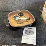 Bella Electric Skillet With Copper Titanium Coating 12"X12" 1200 Watts. Fixed Price $33.99.