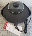 Nib Liven Electric Grill W/ Shabu Hot Pot Model SK-J3201A, For 1- 4 People. Fixed Price $70.00.